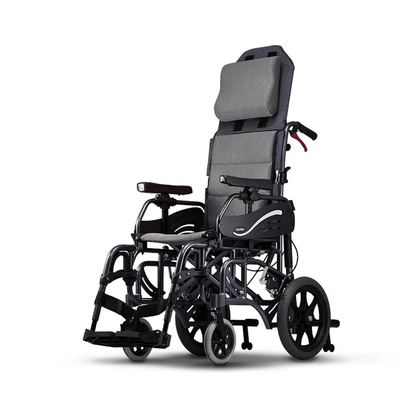 A modern, reclining wheelchair with headrest and armrests, finished in black with a grey upholstered seat and back for enhanced comfort. It features large rear wheels and smaller front wheels for maneuverability, footrests for support, and is designed for user convenience and accessibility.