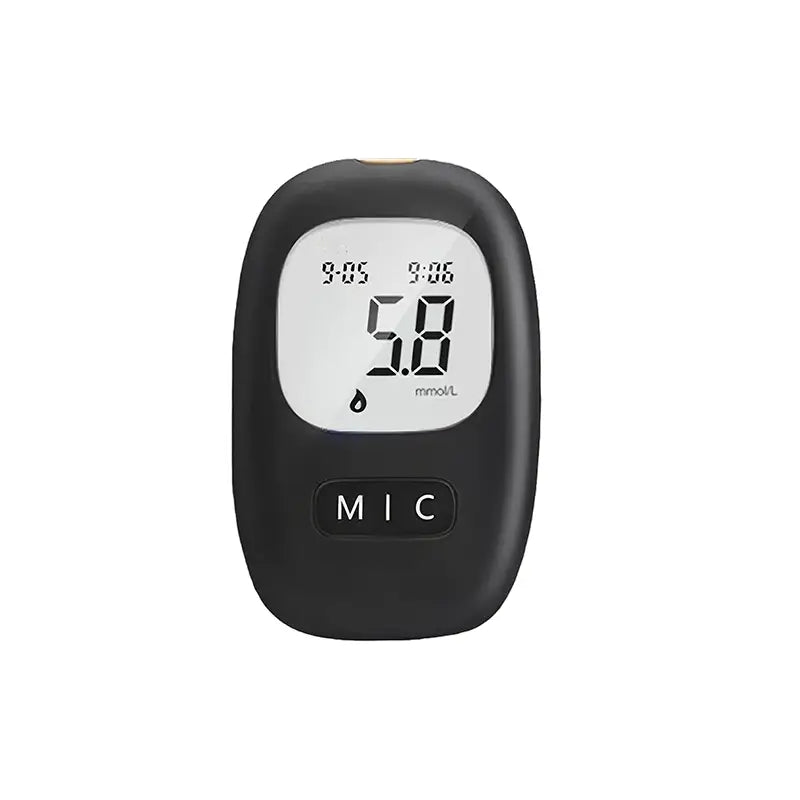 A compact black YUWELL blood glucose meter displaying a blood sugar reading on its digital screen.